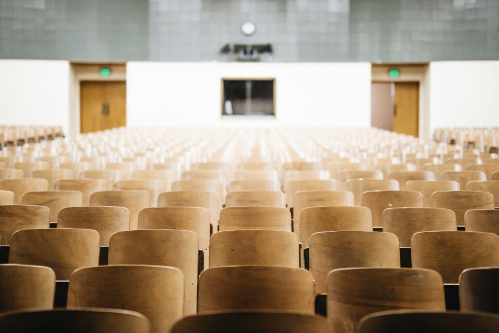 Photo by Nathan Dumlao that shows an empty auditorium.